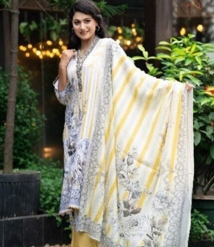 Embroidered Cotton Salwar Kameez – Ruli The Ruli embroidered cotton salwar kameez is designed for women who value both elegance and comfort. The premium Reon / Viscose kameez is lightweight, soft, and breathable—ideal for Bangladesh’s warm climate. This digital printed salwar kameez features chest embroidery with lace on lower sleeves, enhancing the outfit with a refined and feminine look. The coordinated matching Reon orna completes the ensemble. The one-color AC cotton salwar with elastic waistband ensures flexible and all-day comfort. Perfect for daily wear, office, or casual outings, Ruli combines traditional charm with modern practicality. FAQs Q1: Is Ruli salwar kameez suitable for daily wear? A: Yes, the breathable Reon kameez and comfortable AC cotton salwar make it perfect for daily use. Q2: Can I wear Ruli for office occasions? A: Absolutely. Its elegant embroidery and subtle lace detailing make it ideal for office wear. Q3: How should I wash this salwar kameez? A: Use a normal wash with mild detergent to maintain embroidery and fabric quality.